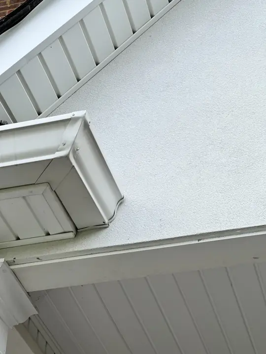 White soffit, fascia and gable panel detail after exterior painting in Ooltewah, TN