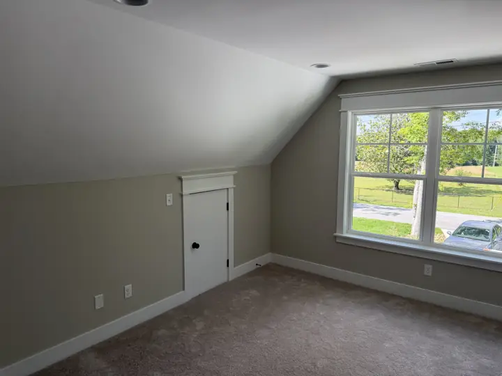 Bonus room with sloped white ceiling, greige walls and white trim, Soddy-Daisy, TN