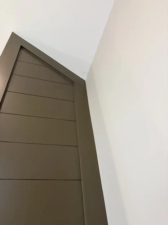 Angled top of olive shiplap surround against a white vaulted ceiling, Soddy-Daisy, TN