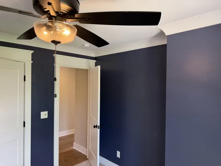 Navy bedroom with white door casings and crown molding, Soddy-Daisy, TN