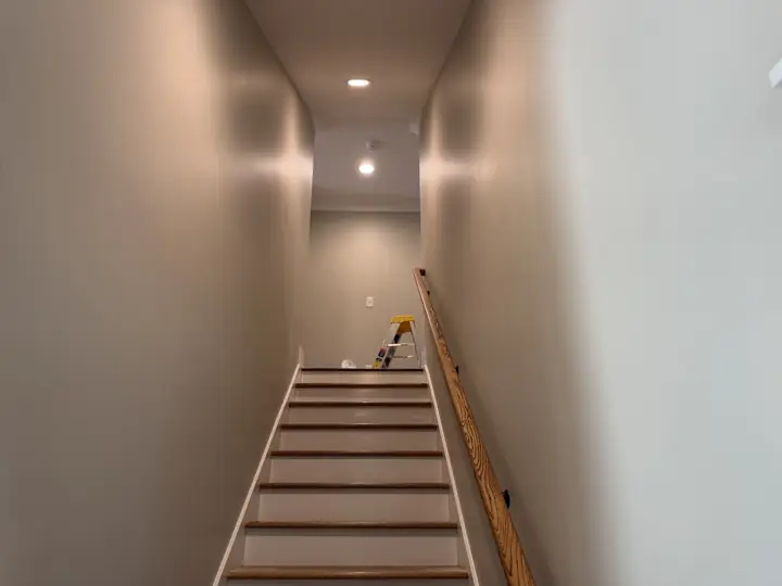 Stairwell with greige walls and white risers after interior painting, Soddy-Daisy, TN