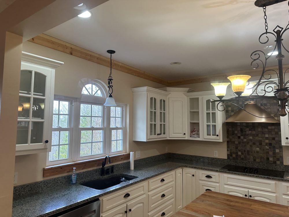 Oak kitchen cabinets repainted in a Chattanooga home