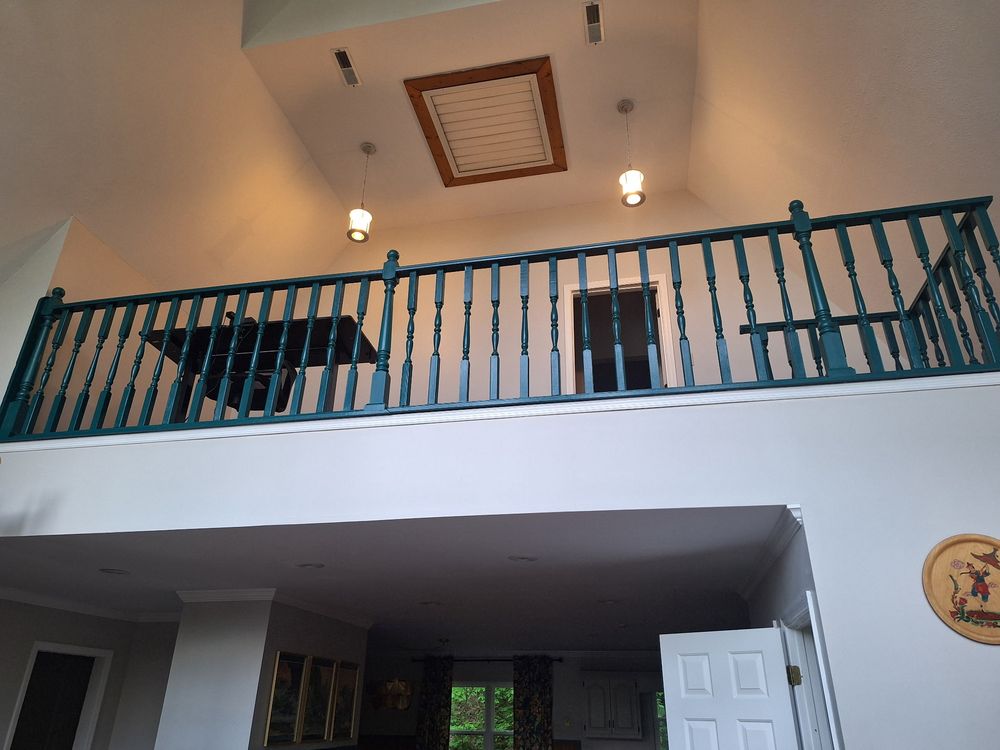 Loft landing with a painted railing