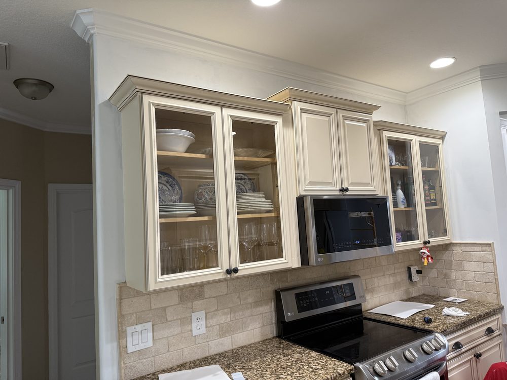 Sprayed kitchen cabinets with a smooth, brush-mark-free finish in a Chattanooga home