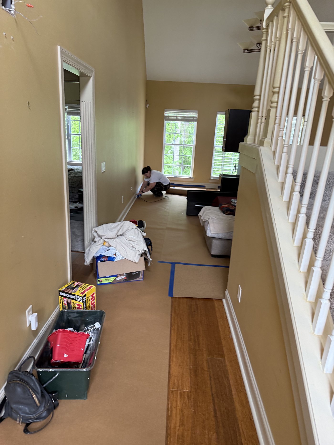 Two-story foyer prep with full protection setup